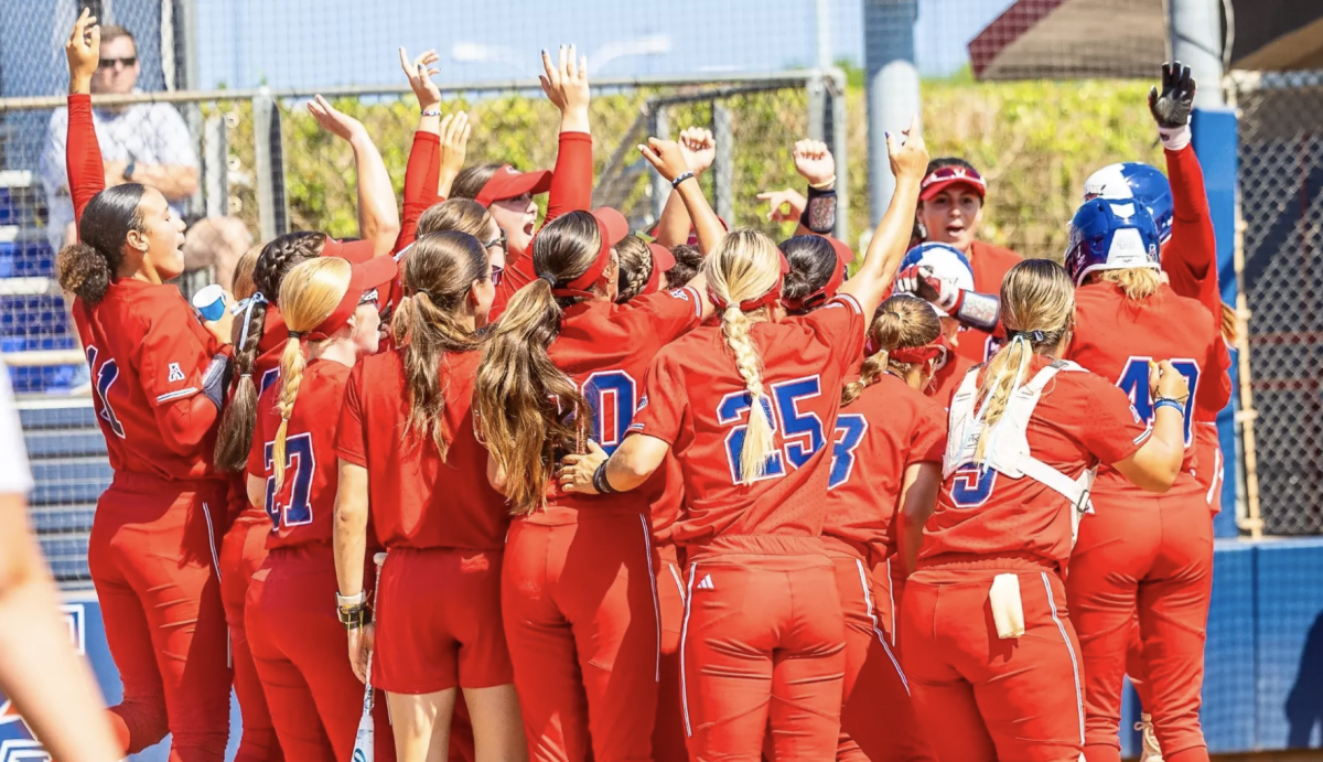 The softball team cheering after winning 6-2 over the University of South Florida Bulls on Apr. 28, 2024. 